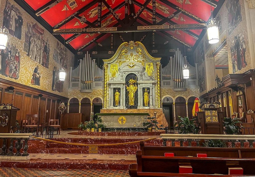 Professional organizer sorting and decluttering a cluttered closet