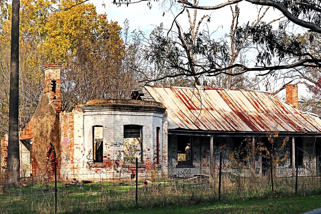 Home organization consultant advising client in living room